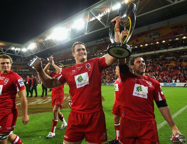 James Horwill celebrates with the Reds in winning Super Rugby