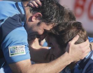 Uruguay players celebrate their Rugby World Cup qualification