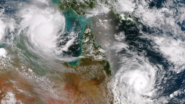 Cyclone Lam (Top left) and Marcia (Bottom Right) over Australia